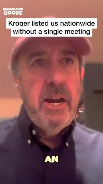 Unpackaged Goods guest wearing a cap beneath a quote about a nationwide Kroger listing without a meeting